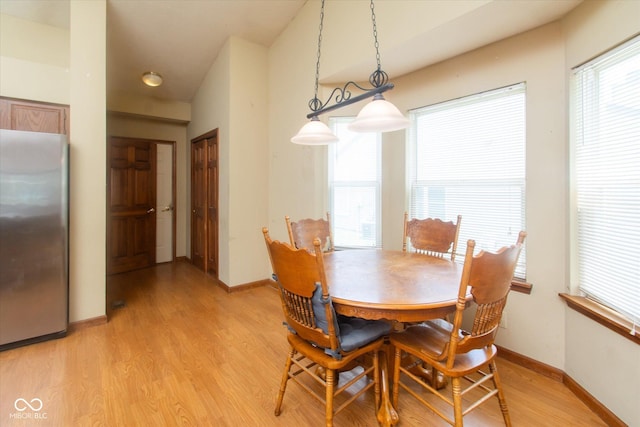4625 Pine Park Ln, Indianapolis, IN 46268 - dining space with light wood-style flooring and baseboards