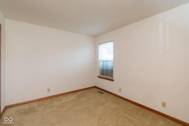 4625 Pine Park Ln, Indianapolis, IN 46268 - empty room featuring baseboards and light carpet
