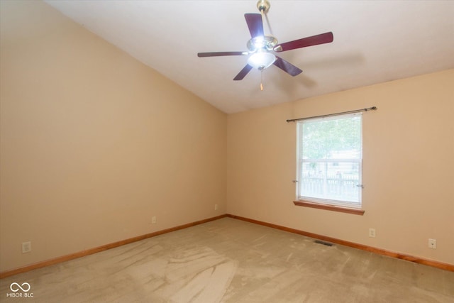 4625 Pine Park Ln, Indianapolis, IN 46268 - unfurnished room featuring ceiling fan, light colored carpet, and vaulted ceiling