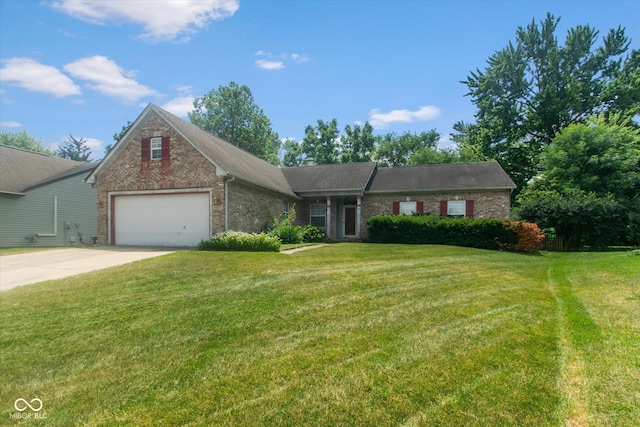 4625 Pine Park Ln, Indianapolis, IN 46268 - view of front of house with brick siding, concrete driveway, a front lawn, and a garage