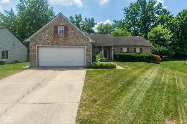 4625 Pine Park Ln, Indianapolis, IN 46268 - view of front of house with brick siding, concrete driveway, a front yard, and an attached garage