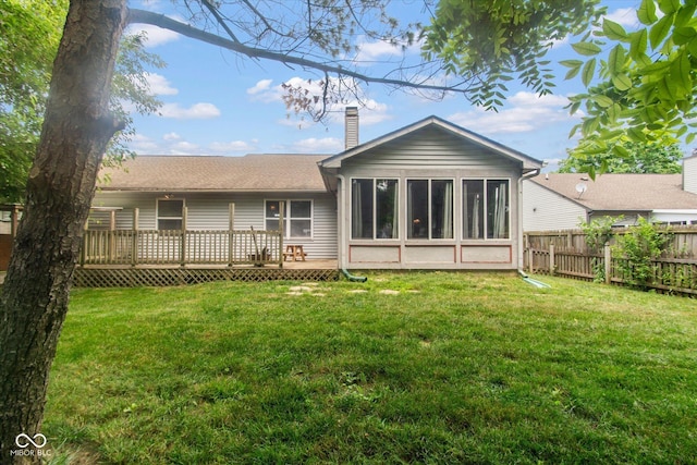 4625 Pine Park Ln, Indianapolis, IN 46268 - rear view of house featuring a chimney, a wooden deck, and a sunroom