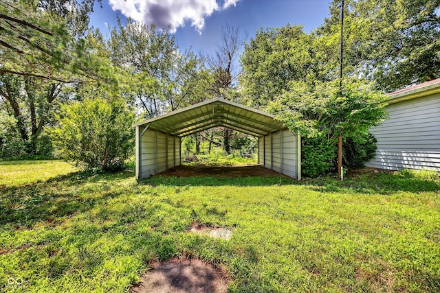 5508 S State Rd 59, Clay City, IN 47841 - view of green lawn featuring a detached carport