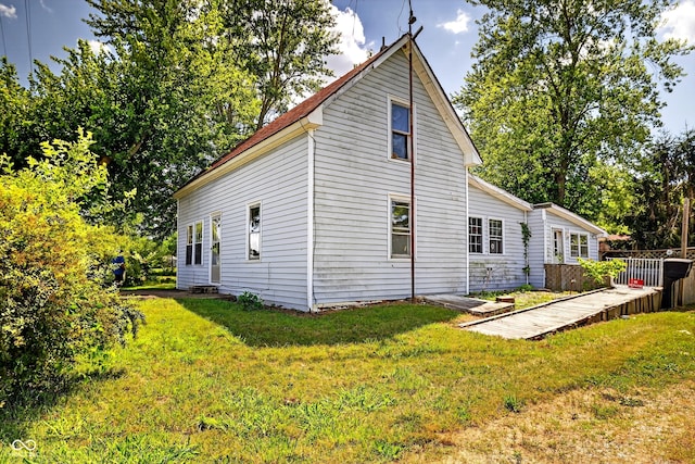 5508 S State Rd 59, Clay City, IN 47841 - back of house with a lawn