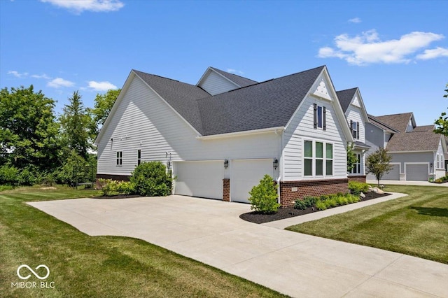 2840 Flowing Creek Pl, Westfield, IN 46074 - view of home's exterior featuring brick siding, a yard, an attached garage, roof with shingles, and concrete driveway