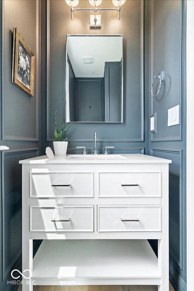 2840 Flowing Creek Pl, Westfield, IN 46074 - bathroom with vanity and a decorative wall