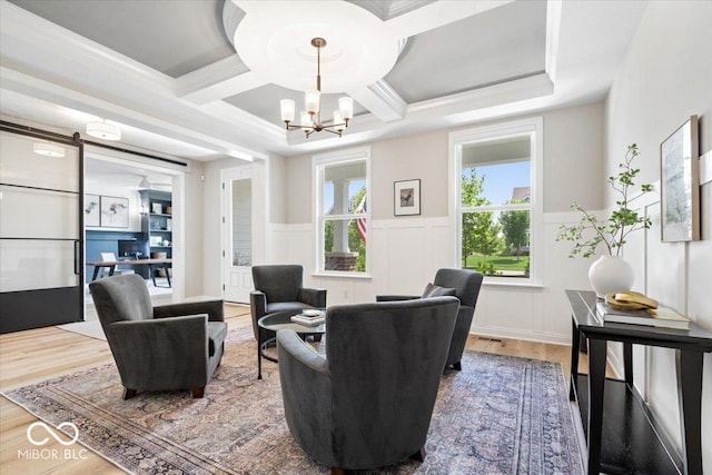 2840 Flowing Creek Pl, Westfield, IN 46074 - living area with coffered ceiling, a chandelier, wood finished floors, a wainscoted wall, and beamed ceiling