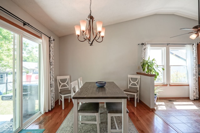 1804 Emerald Pines Ln, Westfield, IN 46074 - dining area featuring light wood-style flooring, a chandelier, lofted ceiling, and a ceiling fan