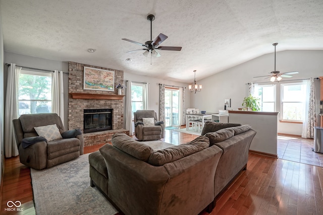 1804 Emerald Pines Ln, Westfield, IN 46074 - living area with a ceiling fan, lofted ceiling, healthy amount of natural light, a textured ceiling, and a chandelier