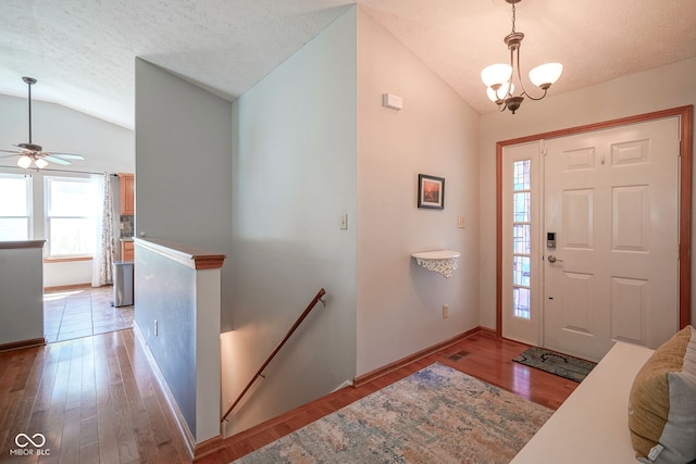 1804 Emerald Pines Ln, Westfield, IN 46074 - foyer with lofted ceiling, a textured ceiling, wood finished floors, and a ceiling fan