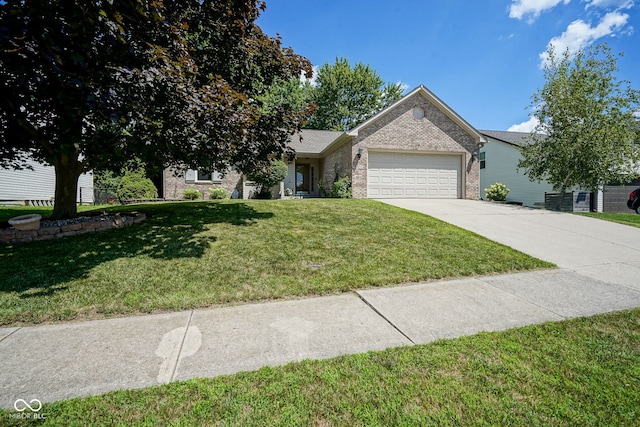 1804 Emerald Pines Ln, Westfield, IN 46074 - view of front of house featuring brick siding, an attached garage, driveway, and a front yard