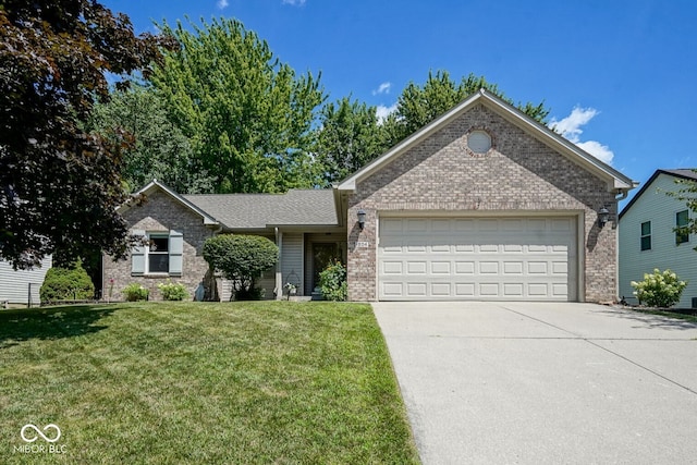 1804 Emerald Pines Ln, Westfield, IN 46074 - ranch-style home featuring concrete driveway, a front lawn, brick siding, and an attached garage