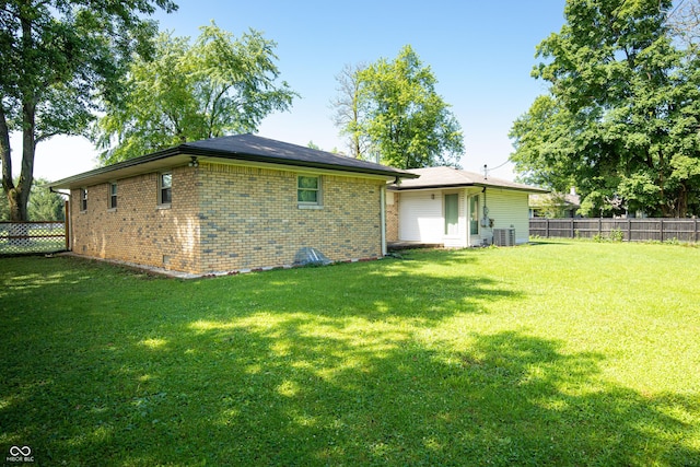 1202 E Stop 10th Rd, Indianapolis, IN 46227 - rear view of property with brick siding