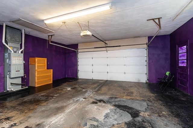 1202 E Stop 10th Rd, Indianapolis, IN 46227 - garage with heating unit and a garage door opener