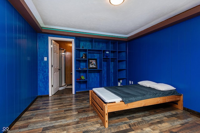 1202 E Stop 10th Rd, Indianapolis, IN 46227 - bedroom featuring dark wood-type flooring and baseboards