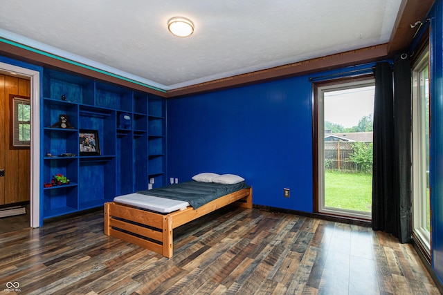 1202 E Stop 10th Rd, Indianapolis, IN 46227 - bedroom with dark wood-style flooring and baseboards