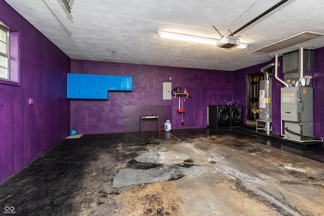 1202 E Stop 10th Rd, Indianapolis, IN 46227 - garage featuring independent washer and dryer, gas water heater, a garage door opener, and heating unit