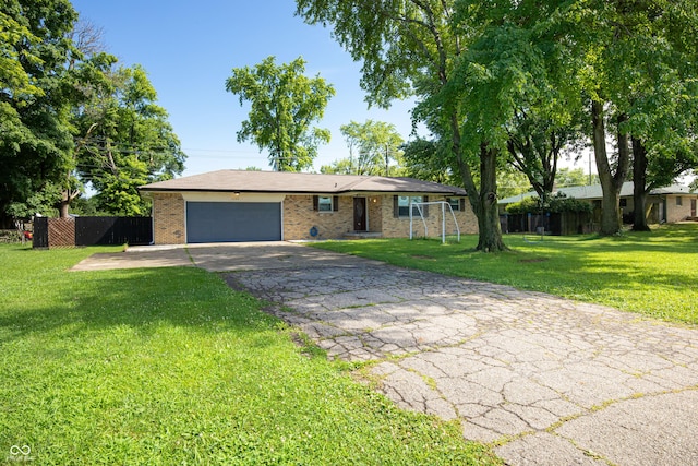 1202 E Stop 10th Rd, Indianapolis, IN 46227 - ranch-style home featuring an attached garage, brick siding, and driveway
