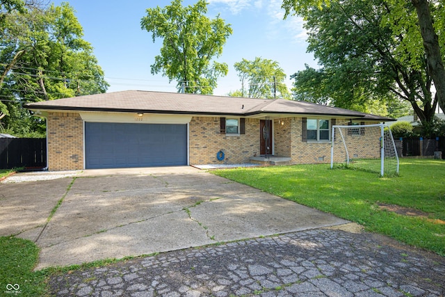 1202 E Stop 10th Rd, Indianapolis, IN 46227 - ranch-style house with an attached garage, driveway, and brick siding