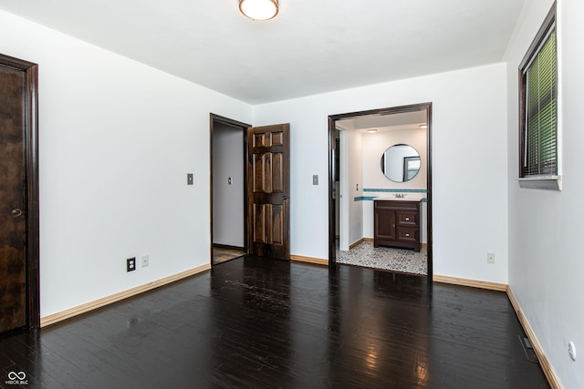 1202 E Stop 10th Rd, Indianapolis, IN 46227 - unfurnished room with wood finished floors and baseboards