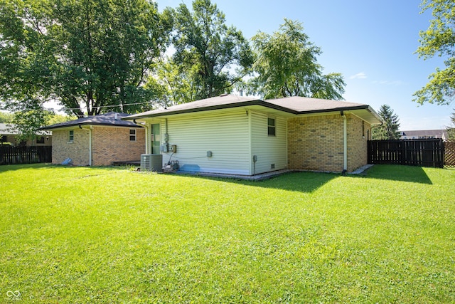1202 E Stop 10th Rd, Indianapolis, IN 46227 - rear view of house featuring brick siding