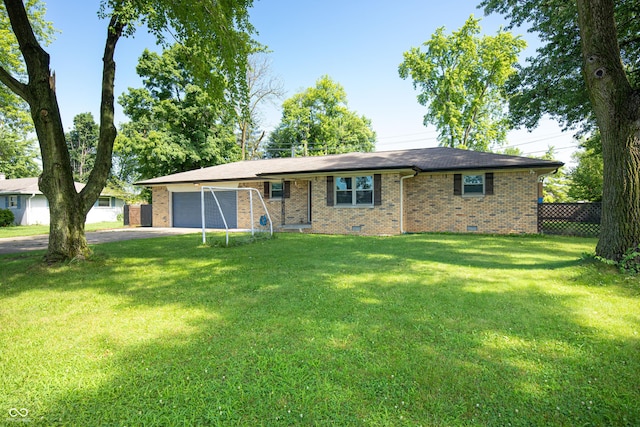 1202 E Stop 10th Rd, Indianapolis, IN 46227 - single story home featuring brick siding, an attached garage, asphalt driveway, crawl space, and a front yard