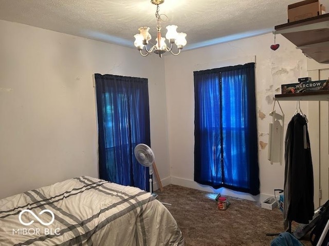 206 N 21st St, New Castle, IN 47362 - bedroom with carpet, a chandelier, and a textured ceiling