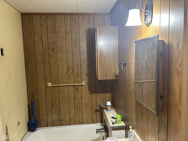 206 N 21st St, New Castle, IN 47362 - bathroom with wooden walls and a tub