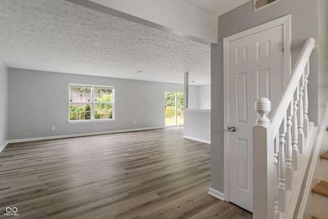 2359 Bremhaven Ct, Indianapolis, IN 46229 - unfurnished room with a textured ceiling and wood finished floors