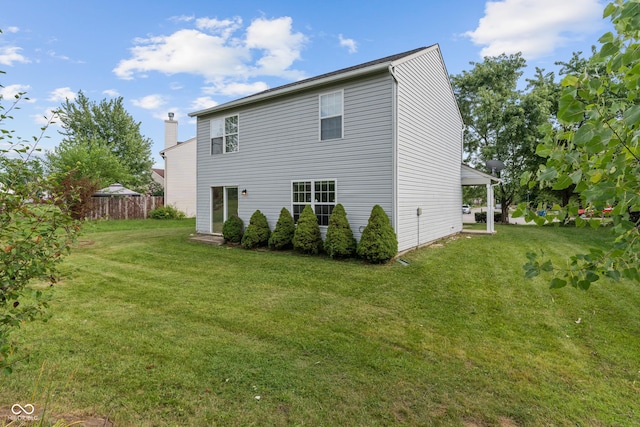 2359 Bremhaven Ct, Indianapolis, IN 46229 - back of house with a chimney