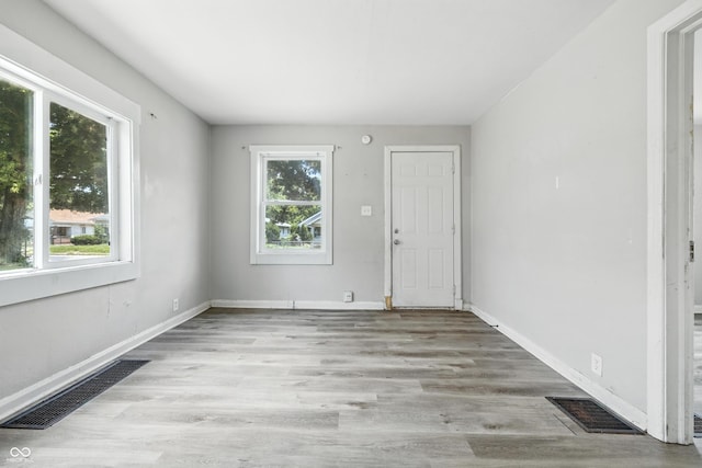 3424 Orchard Ave, Indianapolis, IN 46218 - foyer entrance featuring wood finished floors and baseboards