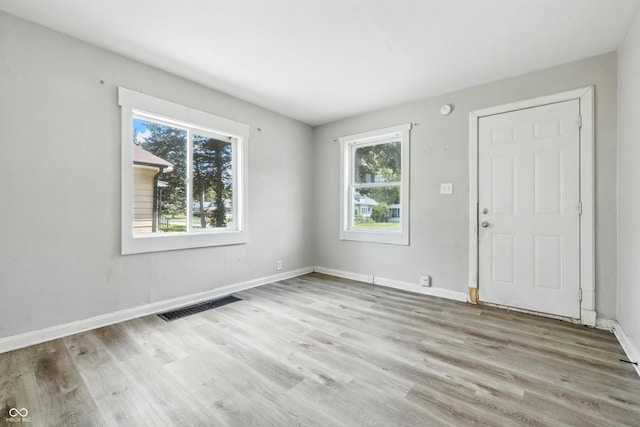 3424 Orchard Ave, Indianapolis, IN 46218 - entryway with plenty of natural light and wood finished floors