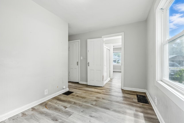 3424 Orchard Ave, Indianapolis, IN 46218 - unfurnished bedroom with wood finished floors and baseboards