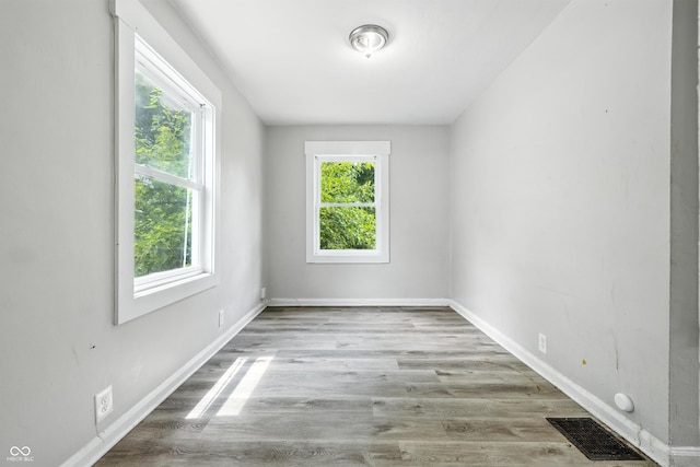 3424 Orchard Ave, Indianapolis, IN 46218 - unfurnished room featuring wood finished floors and baseboards
