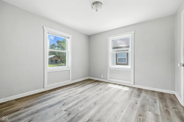 3424 Orchard Ave, Indianapolis, IN 46218 - unfurnished room with wood finished floors and baseboards
