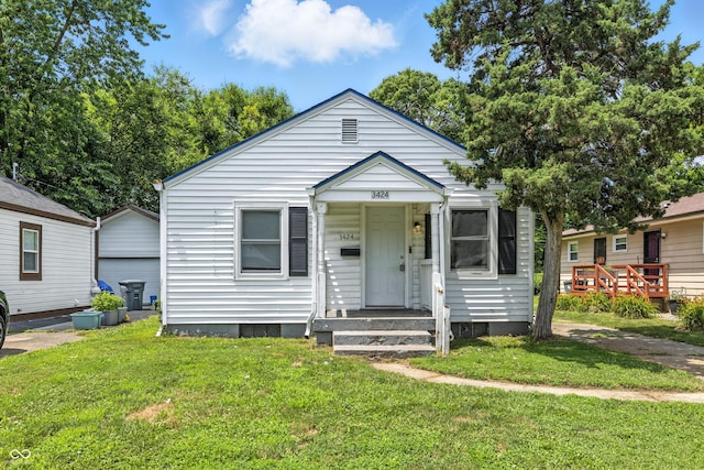 3424 Orchard Ave, Indianapolis, IN 46218 - view of front of house featuring a front lawn