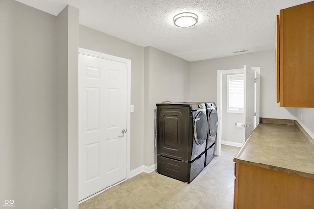 421 Lowry St, Jamestown, IN 46147 - washroom featuring independent washer and dryer, a textured ceiling, and light flooring