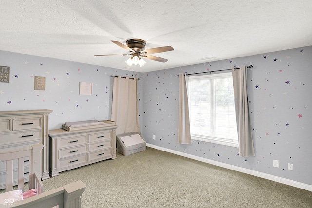 421 Lowry St, Jamestown, IN 46147 - unfurnished bedroom with light carpet, a textured ceiling, and ceiling fan