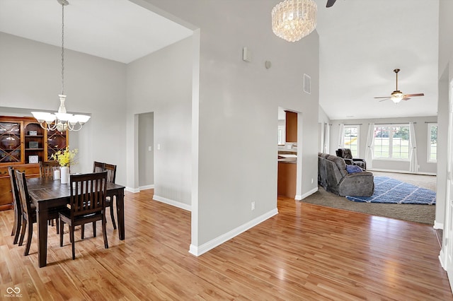 421 Lowry St, Jamestown, IN 46147 - dining room with a chandelier, high vaulted ceiling, and light wood-style floors