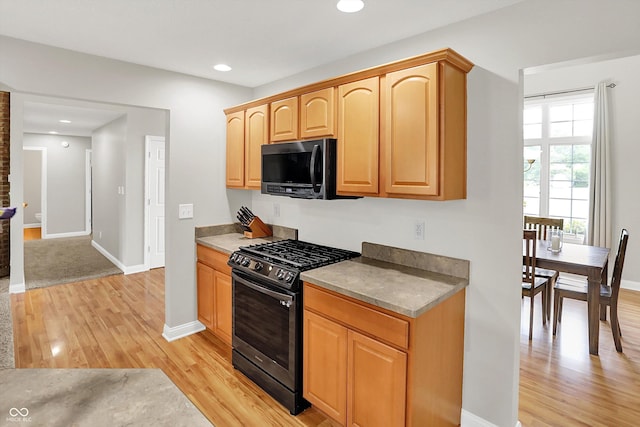 421 Lowry St, Jamestown, IN 46147 - kitchen featuring stainless steel range with gas cooktop, light wood finished floors, recessed lighting, and light brown cabinets