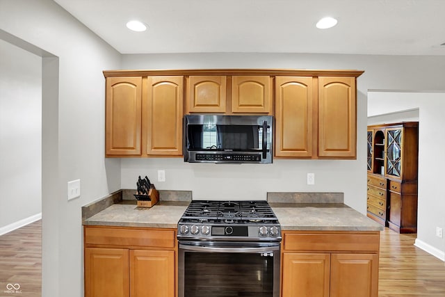 421 Lowry St, Jamestown, IN 46147 - kitchen featuring appliances with stainless steel finishes, light wood-type flooring, and recessed lighting