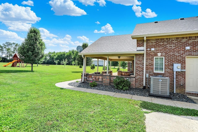 421 Lowry St, Jamestown, IN 46147 - view of green lawn with a patio and a playground