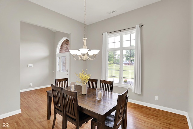 421 Lowry St, Jamestown, IN 46147 - dining room featuring a chandelier and light wood-style flooring