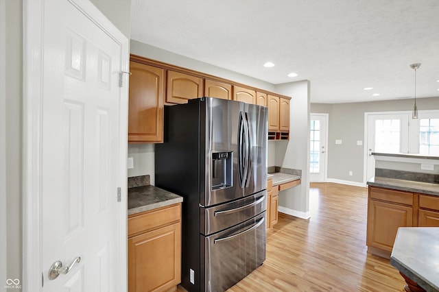 421 Lowry St, Jamestown, IN 46147 - kitchen featuring stainless steel fridge, light wood finished floors, decorative light fixtures, and recessed lighting