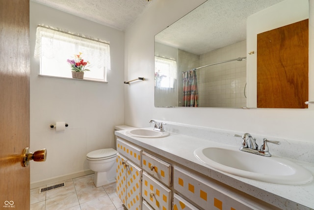 5425 Gambel Rd, Indianapolis, IN 46221 - full bath featuring a textured ceiling, double vanity, curtained shower, and tile patterned flooring