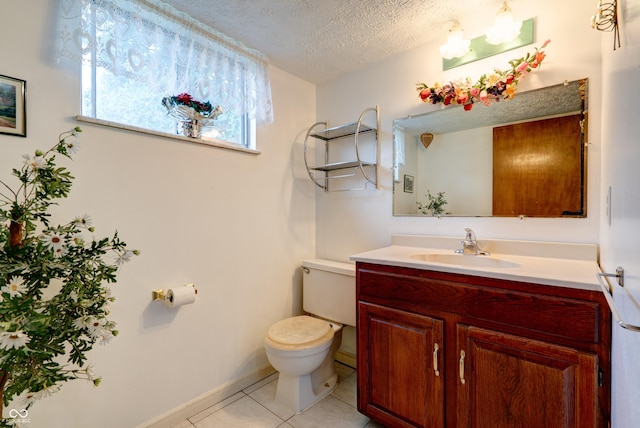 5425 Gambel Rd, Indianapolis, IN 46221 - half bathroom featuring vanity, a textured ceiling, and tile patterned flooring