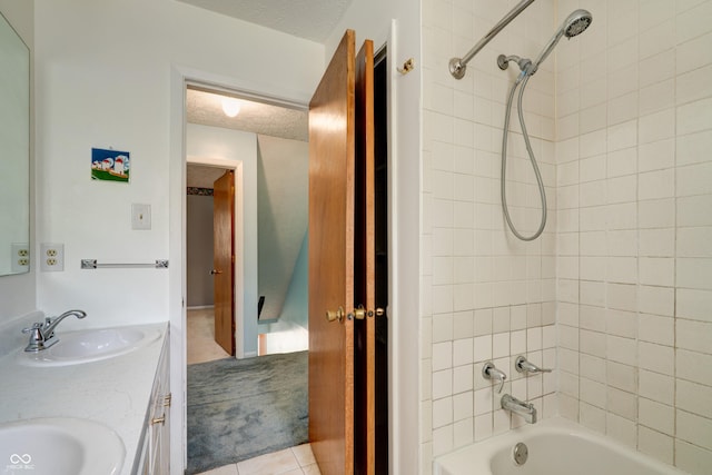 5425 Gambel Rd, Indianapolis, IN 46221 - full bathroom with bathing tub / shower combination, double vanity, tile patterned flooring, and a textured ceiling
