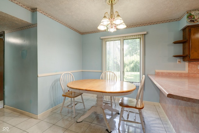 5425 Gambel Rd, Indianapolis, IN 46221 - dining room with a textured ceiling, a chandelier, light tile patterned floors, and ornamental molding