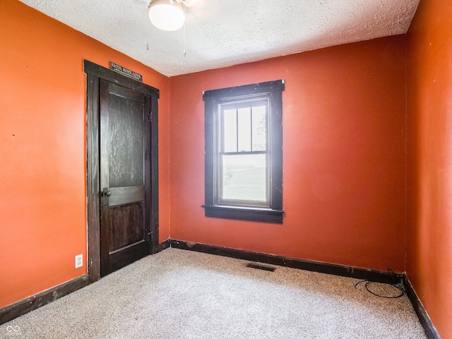 1556 E 400 S, Greenfield, IN 46140 - unfurnished room with carpet floors and a textured ceiling