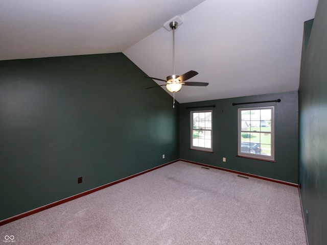 4443 W Windsong Ct, New Palestine, IN 46163 - carpeted spare room with vaulted ceiling and ceiling fan